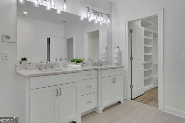 113 Quinn Way, Milton, GA 30004 - full bath featuring double vanity, a spacious closet, and baseboards