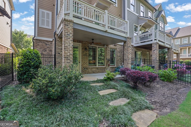 113 Quinn Way, Milton, GA 30004 - rear view of house featuring brick siding and a balcony