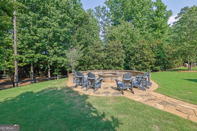 113 Quinn Way, Milton, GA 30004 - view of yard featuring an outdoor fire pit and a patio