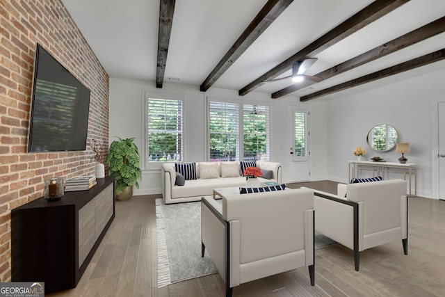 113 Quinn Way, Milton, GA 30004 - living area with plenty of natural light, wood finished floors, baseboards, ceiling fan, and beam ceiling