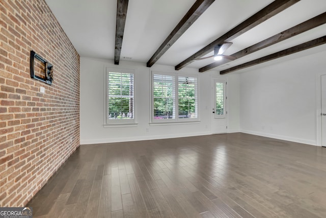 113 Quinn Way, Milton, GA 30004 - unfurnished living room with baseboards, brick wall, dark wood-style flooring, beamed ceiling, and ceiling fan