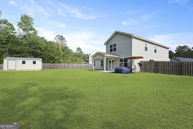33 Easy St, Guyton, GA 31312 - back of house with a hot tub and a patio