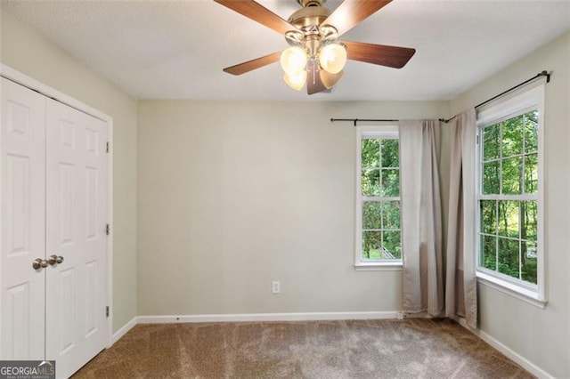 14 Augusta Way, Hiram, GA 30141 - carpeted empty room with baseboards and a ceiling fan