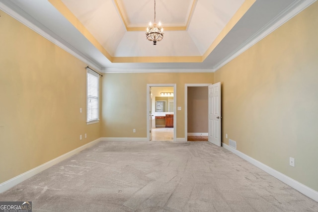 203 Crescent Moon Way, Canton, GA 30114 - unfurnished bedroom with a chandelier, a raised ceiling, carpet floors, ornamental molding, and ensuite bathroom