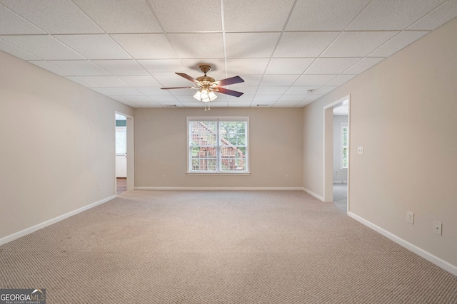 203 Crescent Moon Way, Canton, GA 30114 - empty room featuring a paneled ceiling, light colored carpet, ceiling fan, and baseboards