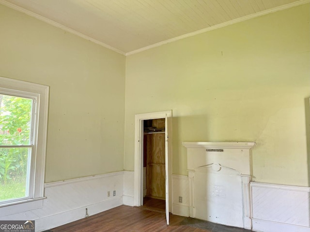 459 Railroad Ave, Flovilla, GA 30216 - unfurnished bedroom with ornamental molding, dark wood-style flooring, multiple windows, and a wainscoted wall