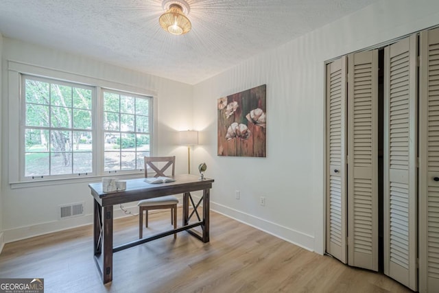 2825 Shea Way SW, Marietta, GA 30060 - office with a textured ceiling and light wood-style flooring