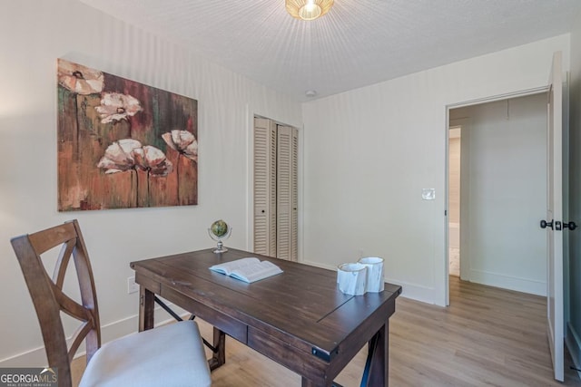 2825 Shea Way SW, Marietta, GA 30060 - office area with light wood-style floors and baseboards