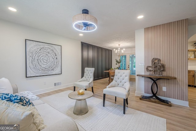 2825 Shea Way SW, Marietta, GA 30060 - sitting room featuring light wood-type flooring, baseboards, a chandelier, and recessed lighting