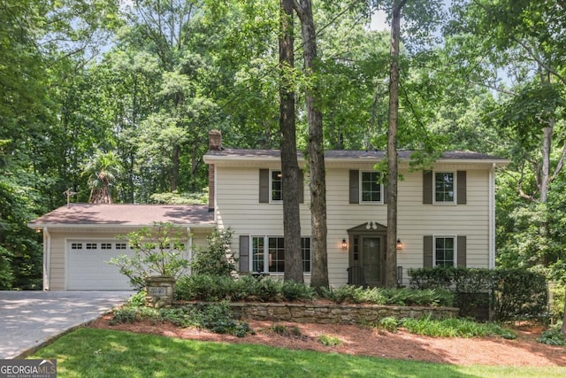 5240 Arrie Way, Atlanta, GA 30360 - colonial inspired home with driveway, an attached garage, and a chimney