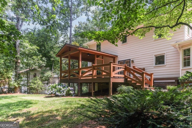 5240 Arrie Way, Atlanta, GA 30360 - back of property featuring a wooden deck and a yard