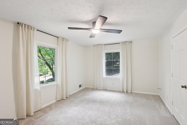 5240 Arrie Way, Atlanta, GA 30360 - empty room with carpet flooring, ceiling fan, a textured ceiling, and baseboards