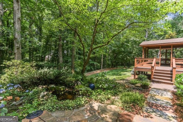 5240 Arrie Way, Atlanta, GA 30360 - view of yard with a wooden deck and a wooded view
