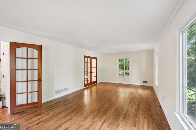 5240 Arrie Way, Atlanta, GA 30360 - unfurnished room featuring wood finished floors, crown molding, healthy amount of natural light, and baseboards