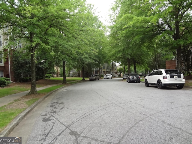 245 Amal Dr SW Apt 2010, Atlanta, GA 30315 - view of asphalt street featuring curbs and sidewalks