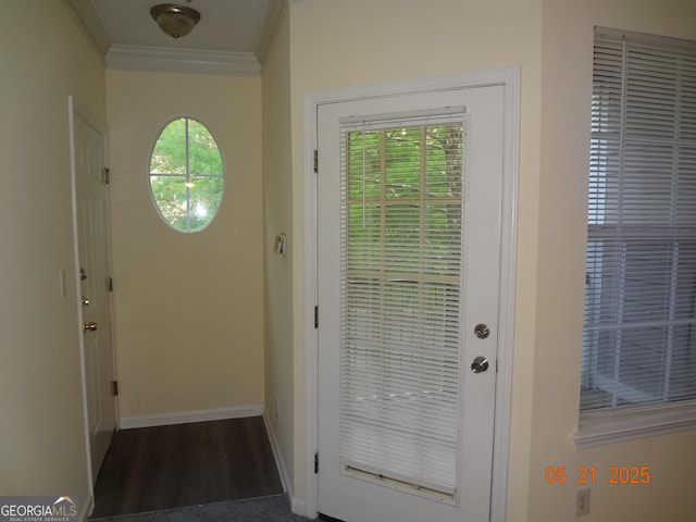 245 Amal Dr SW Apt 2010, Atlanta, GA 30315 - entryway featuring crown molding, baseboards, and wood finished floors