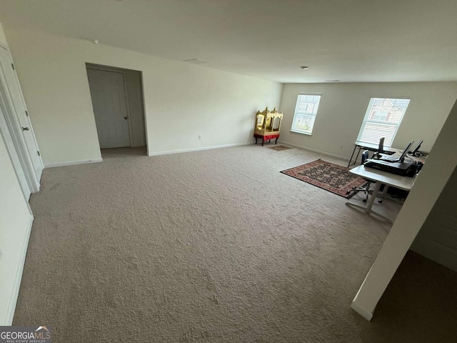3378 English Elm Way, Loganville, GA 30052 - carpeted living room with baseboards
