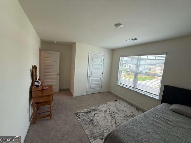 3378 English Elm Way, Loganville, GA 30052 - bedroom with light carpet, baseboards, and a closet