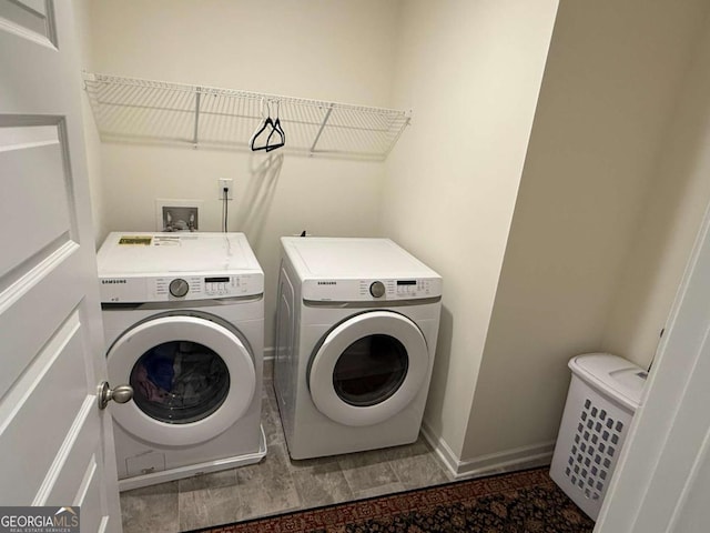 3378 English Elm Way, Loganville, GA 30052 - laundry area featuring independent washer and dryer and baseboards