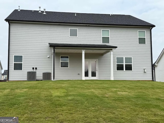 3378 English Elm Way, Loganville, GA 30052 - back of property with a lawn, cooling unit, and french doors