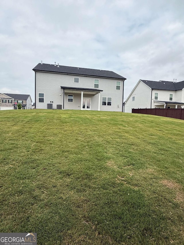 3378 English Elm Way, Loganville, GA 30052 - back of house featuring central AC unit