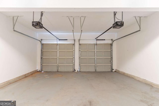 171 Stillwood Dr, Newnan, GA 30265 - garage featuring a garage door opener