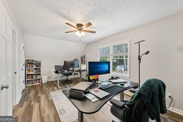 130 Emerald Dr, Mcdonough, GA 30253 - home office with a ceiling fan, wood finished floors, a textured ceiling, and lofted ceiling
