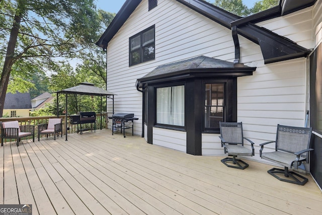 130 Emerald Dr, Mcdonough, GA 30253 - wooden deck with a gazebo, grilling area, and outdoor dining space
