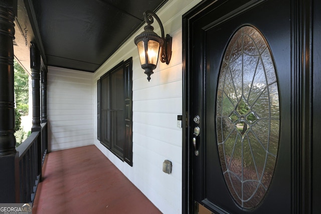 130 Emerald Dr, Mcdonough, GA 30253 - doorway to property featuring a porch