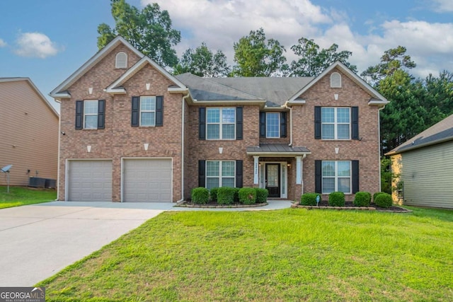 2482 Brittany Park Ln, Ellenwood, GA 30294 - view of front facade featuring concrete driveway, brick siding, a front yard, a garage, and cooling unit