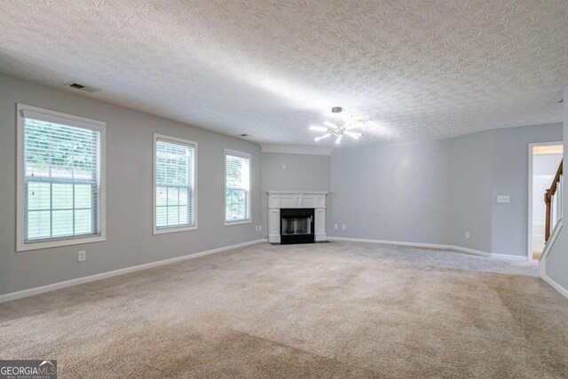 2482 Brittany Park Ln, Ellenwood, GA 30294 - unfurnished living room with stairs, light colored carpet, baseboards, a fireplace, and a chandelier