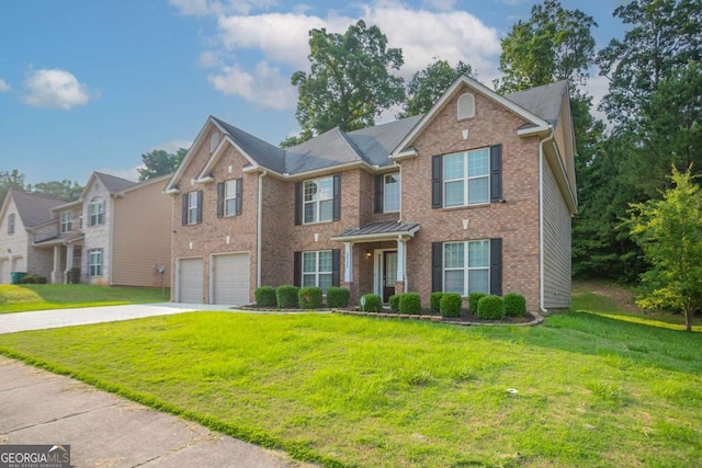 2482 Brittany Park Ln, Ellenwood, GA 30294 - view of front facade featuring driveway, an attached garage, brick siding, and a front yard