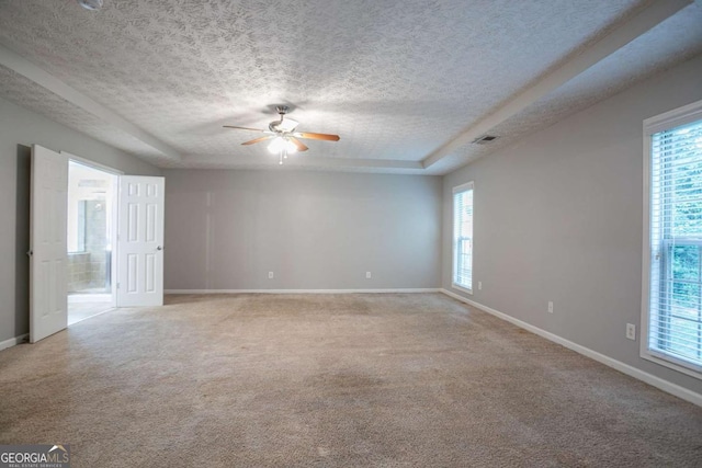 2482 Brittany Park Ln, Ellenwood, GA 30294 - unfurnished room featuring ceiling fan, healthy amount of natural light, baseboards, and a textured ceiling