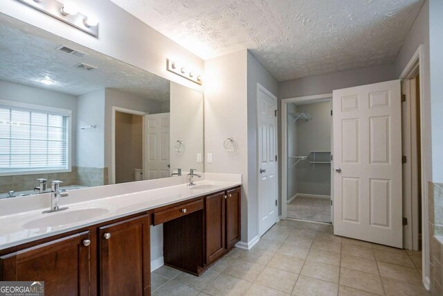 2482 Brittany Park Ln, Ellenwood, GA 30294 - spacious closet featuring carpet floors