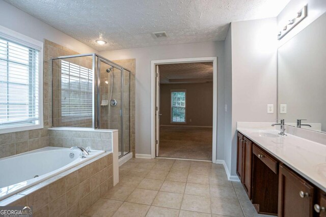 2482 Brittany Park Ln, Ellenwood, GA 30294 - unfurnished room with carpet flooring, ceiling fan, healthy amount of natural light, baseboards, and a textured ceiling