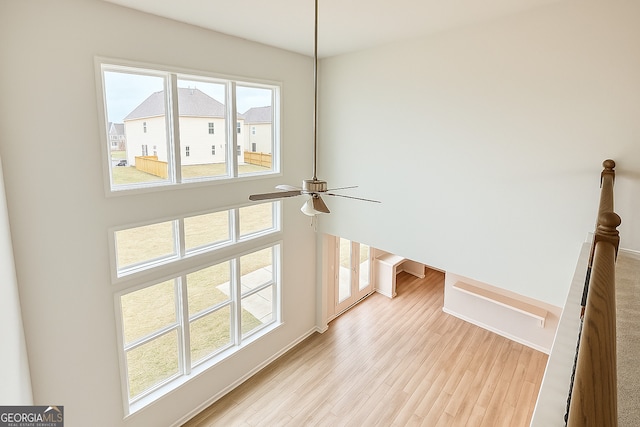 3468 Jasmine Way SW, South Fulton, GA 30331 - detailed view of wood finished floors, a ceiling fan, and baseboards