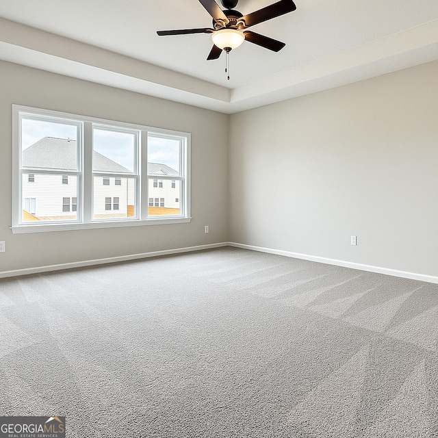 3468 Jasmine Way SW, South Fulton, GA 30331 - spare room featuring carpet, baseboards, and ceiling fan