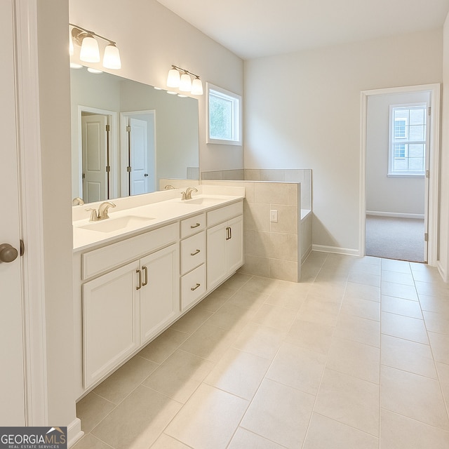 3468 Jasmine Way SW, South Fulton, GA 30331 - full bathroom with double vanity, tile patterned floors, and baseboards