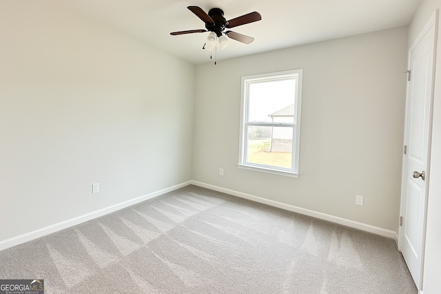 3468 Jasmine Way SW, South Fulton, GA 30331 - unfurnished room featuring baseboards, light colored carpet, and a ceiling fan