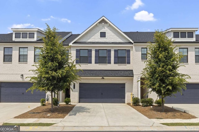 3546 Sorrel Ln, Duluth, GA 30096 - townhome / multi-family property with a garage, concrete driveway, and brick siding