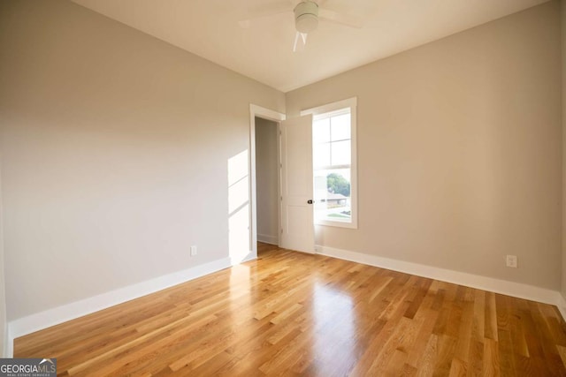 982 Wildberry Ct, Jefferson, GA 30549 - unfurnished room featuring a ceiling fan, baseboards, and light wood-style flooring