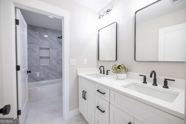 982 Wildberry Ct, Jefferson, GA 30549 - full bathroom featuring marble finish flooring, double vanity, baseboards, and washtub / shower combination