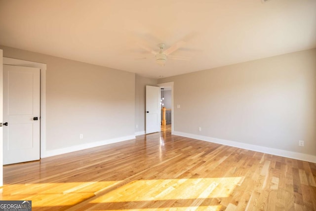 982 Wildberry Ct, Jefferson, GA 30549 - unfurnished bedroom with baseboards, light wood-type flooring, and ceiling fan