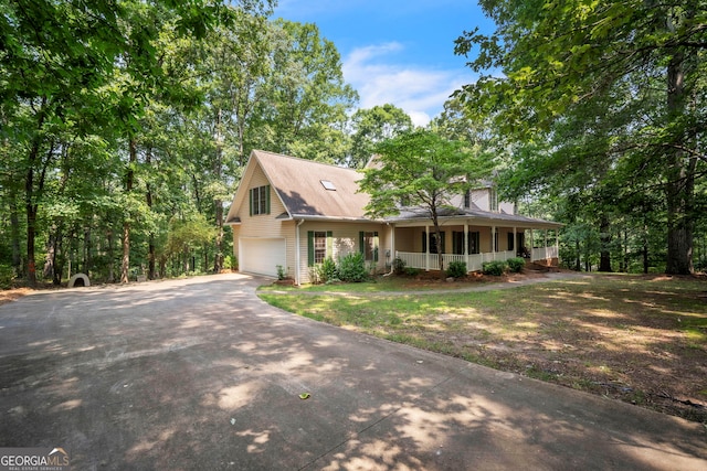 242 Pristine Cv, Hartwell, GA 30643 - view of front facade featuring a porch, asphalt driveway, an attached garage, and a shingled roof