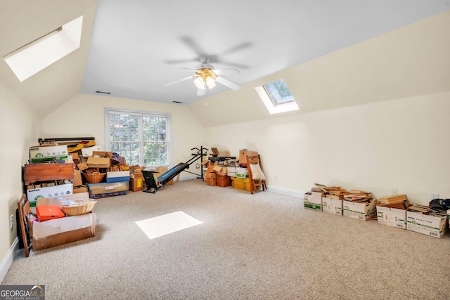 242 Pristine Cv, Hartwell, GA 30643 - rec room with a skylight, lofted ceiling, carpet, a ceiling fan, and baseboards