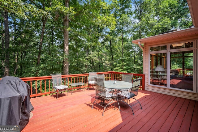 242 Pristine Cv, Hartwell, GA 30643 - wooden deck with outdoor dining space and a grill
