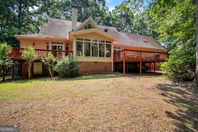 242 Pristine Cv, Hartwell, GA 30643 - back of house featuring a deck, a sunroom, a chimney, a lawn, and roof with shingles