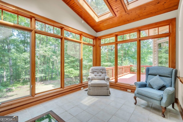 242 Pristine Cv, Hartwell, GA 30643 - sunroom with tile patterned floors, wood ceiling, vaulted ceiling, a skylight, and plenty of natural light