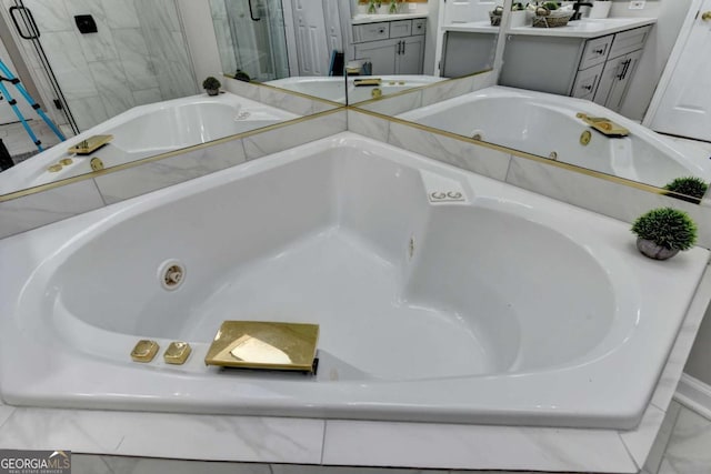 4901 Briarleigh Chase SW, Mableton, GA 30126 - full bathroom featuring vanity, a tub with jets, and a shower stall