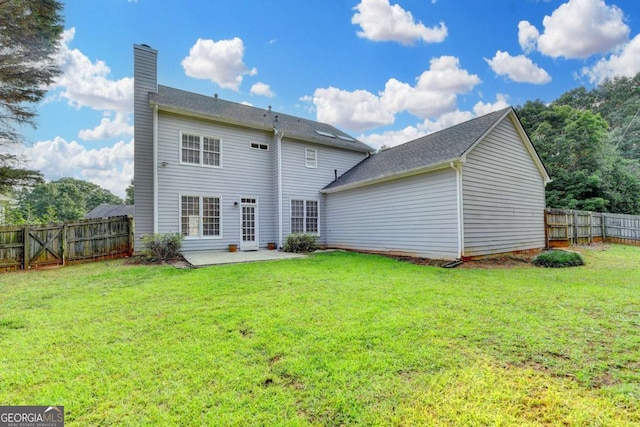 4901 Briarleigh Chase SW, Mableton, GA 30126 - rear view of house featuring a patio, a chimney, and a fenced backyard